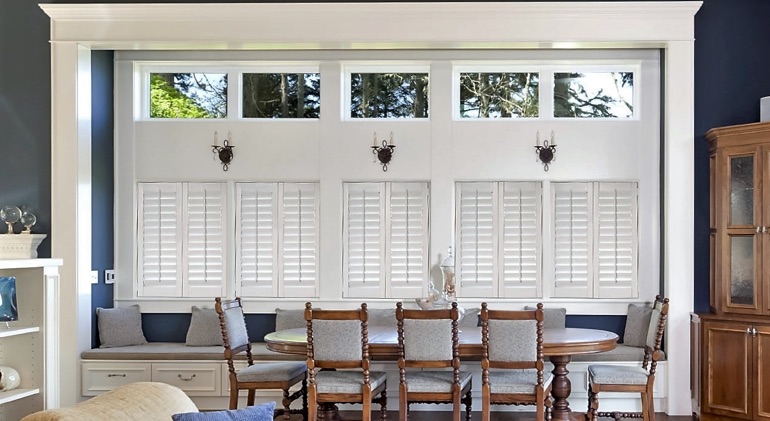 Houston dining room with Studio plantation shutters.